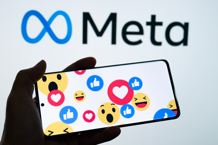 Meta logo is shown on a device screen